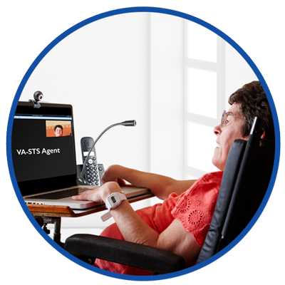 VA-STS user on a wheelchair with a laptop and webcam